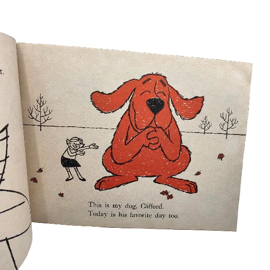 A vintage children's book page featuring a hand-drawn illustration of Clifford, the red dog, sitting on beige paper with printed text below reading, 'This is my dog, Clifford. Today is his favorite day too.