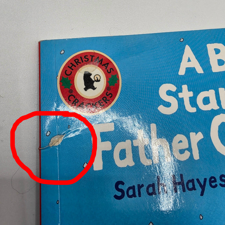 A close-up of the upper-left corner of a children's book titled 'A Bad Start for Father Christmas.