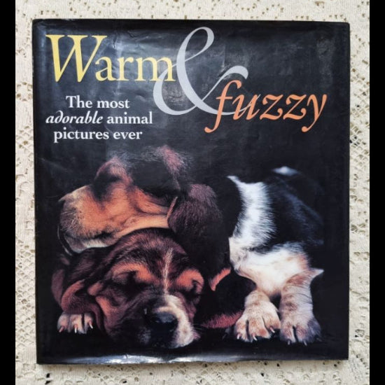 Front cover to Warm & Fuzzy: the most adorable animal pictures ever.