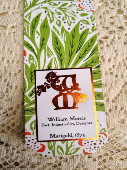 A close up of the text box on a bookmark of William Morris' Marigold design from 1875