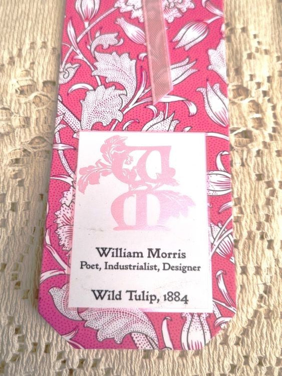 A closeup of a bookmark of William Morris' Wild Tulip design from 1884
