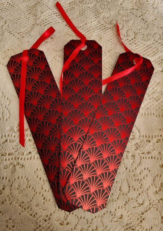 3 copies of a bookmark of the Art Deco design Crimson Scallop