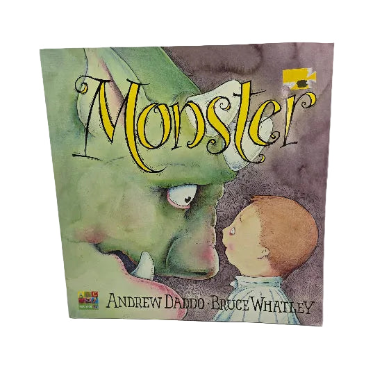 Children's book titled 'Monster' by Andrew Daddo and Bruce Whatley, featuring an illustration of a green monster face and a child on the cover.