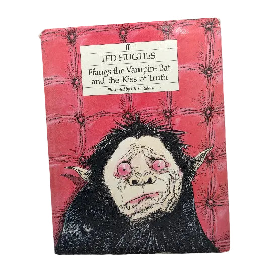A vintage hardcover book of the same title by Ted Hughes, featuring a red tufted background and an illustration of a black-haired creature with pink eyes on the cover.
