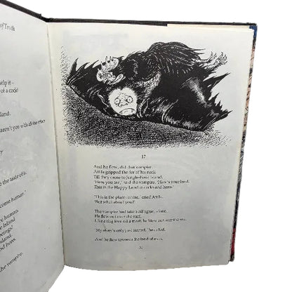 A page from the book showing a black-and-white illustration of a figure lying on the ground with a rooster on top of him. 