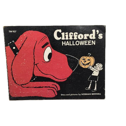 Vintage Clifford's Halloween book cover, featuring the red Clifford dog on a black background with white title text and a small child holding a jack-o'-lantern.