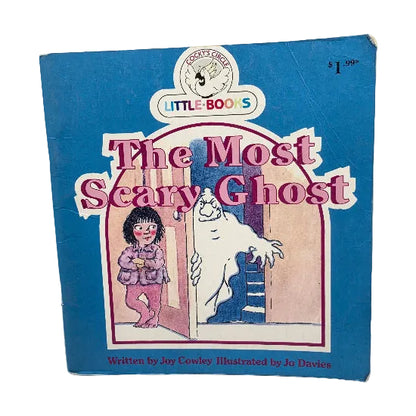 Vintage paperback children's book titled "The Most Scary Ghost" from the Little Books series, featuring a blue cover with an illustration of a girl and a ghost.