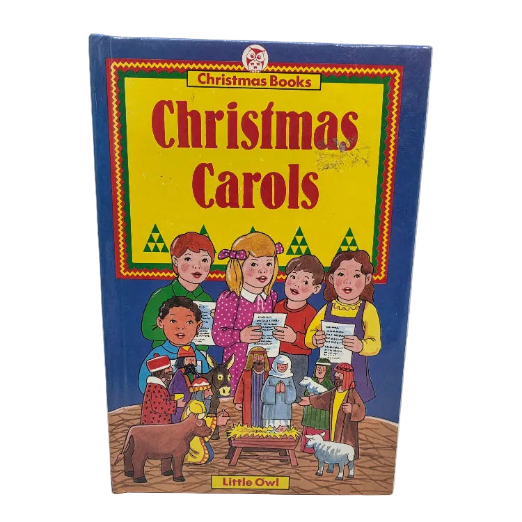 A vintage hardcover children's book titled 'Christmas Carols' from the 'Little Owl' series, featuring a colourful illustration of children singing carols with a nativity scene in the foreground.