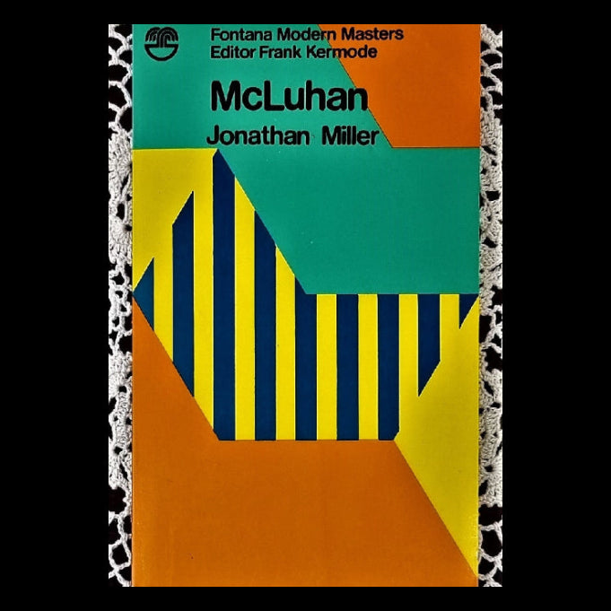 The cover of the book 'McLuhan' features a vibrant, geometric design with bold yellow and blue stripes on an orange background.