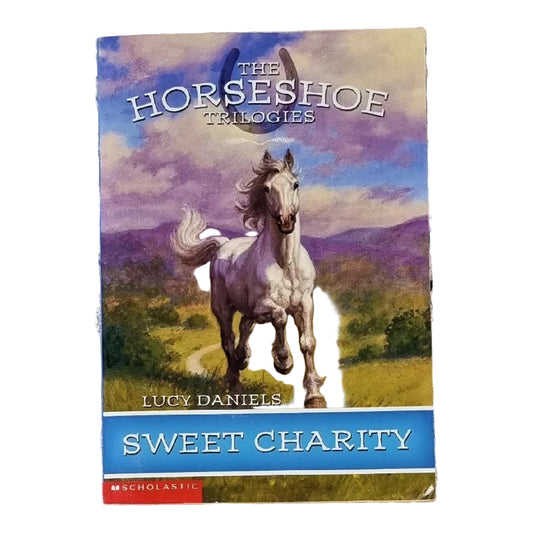 Cover of the book 'Sweet Charity' featuring an illustration of a white horse running in a field with a blue sky and mountains in the background.