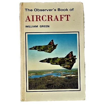 Vintage hardcover titled 'The Observer's Book of Aircraft' by William Green, featuring a cover illustration of two military jets flying over water.