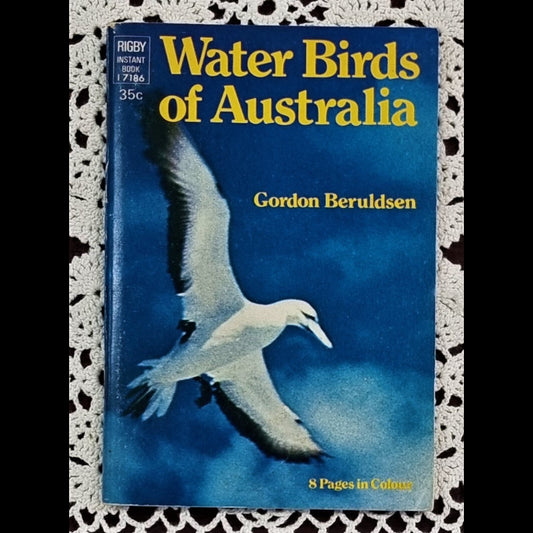 Paperback book titled 'Water Birds of Australia' with a image of a seagull in flight on the cover.