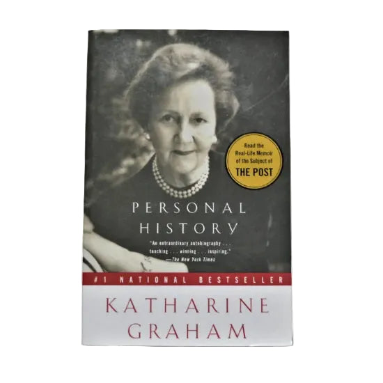 A paperback book titled 'Personal History' by Katherine Graham with a portrait of the author on the cover.
