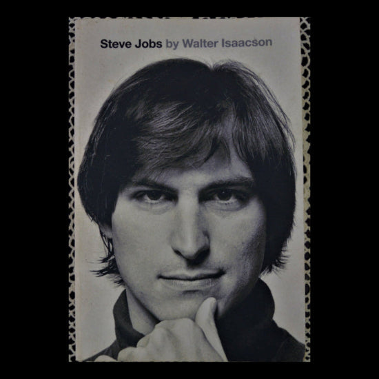Black and white photograph of a young Steve Jobs on the cover of a book.