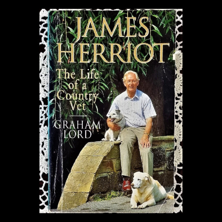 Cover of the book 'James Herriot: The Life of a Country Vet' showing a portrait of a man with  dogs nearby, against a backdrop of a stone wall and trees.