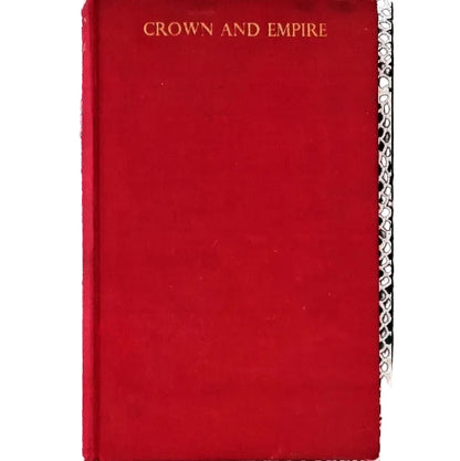 A red hard cover book with a title on the cover.