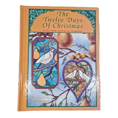 Book cover.  Contains two removable Christmas ornaments in stained glass imagery.