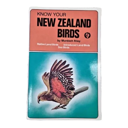 A vintage paperback book titled 'Know Your New Zealand Birds' by Murdoch Riley, featuring a terracotta orange top section and a turquoise lower section with an illustration of a flying bird.